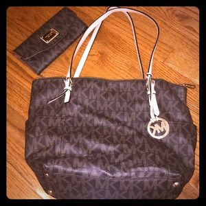 Brown Michael Kors purse and wallet